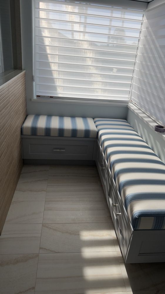 Custom window bench with blue and white striped cushions